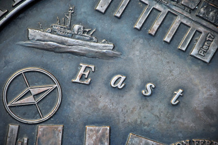 Vintage compass on a metal background, close-up of photo