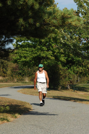 man jogging in the park on a sunny day, fitness and healthy lifestyle
