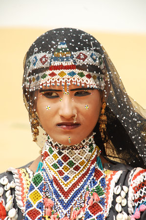 Unidentified Thai woman in traditional costume at annual festival in Chiang Mai, Thailand.のeditorial素材