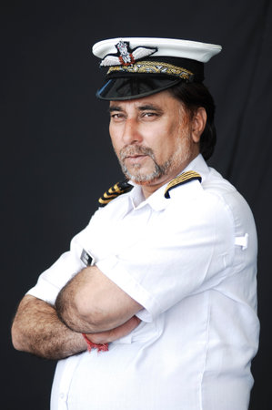 Portrait of a mature man in the form of a pilot.