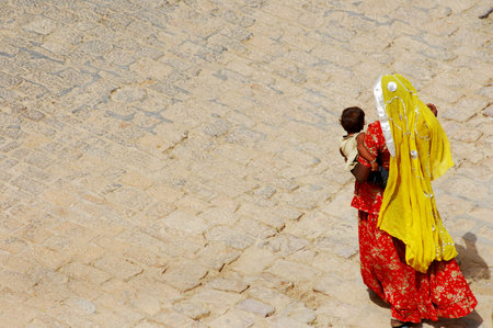 Unidentified people in red sariの写真素材