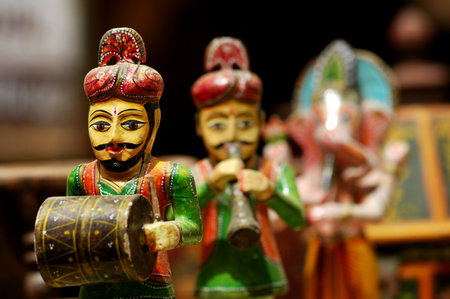 Traditional indian wooden handicrafts on display at local market.の写真素材