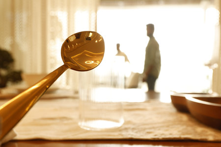 Spoon on the table in the hotel room. Selective focus.の写真素材