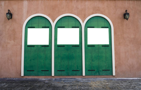 three white poster on wall in outdoorの写真素材