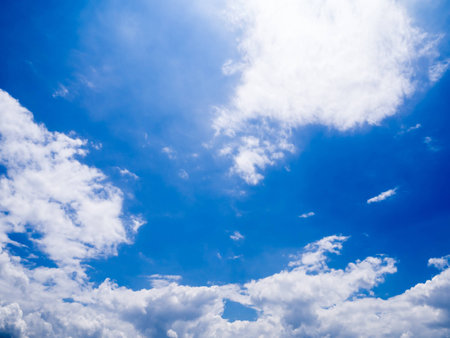 Blue sky with cloudsの写真素材