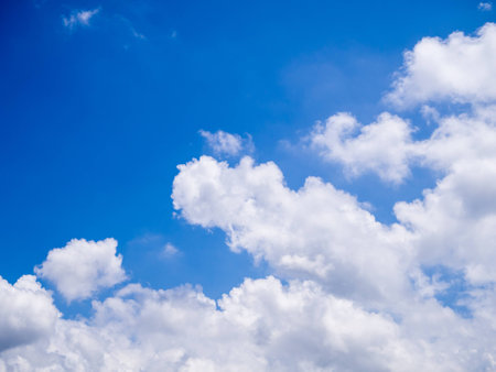 Blue sky with cloudsの写真素材