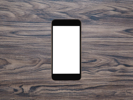 smartphone on wood backgroundの写真素材