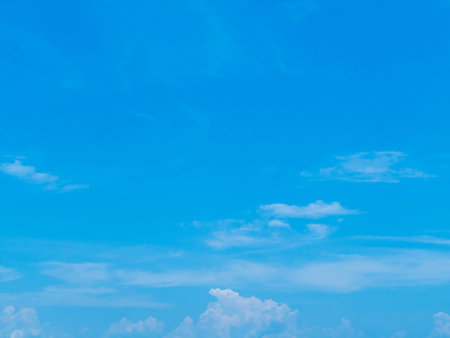 Blue sky with cloudsの写真素材