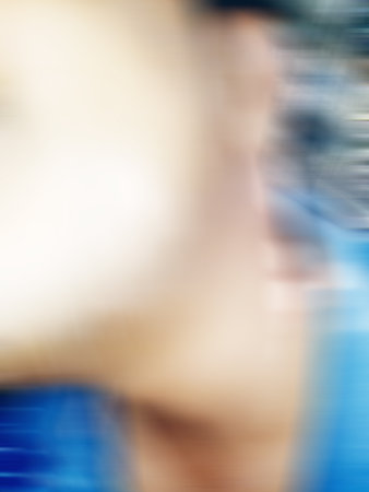 An Indian or asian guy showing his funny facial expression to the camera. Blurred or defocused image.の写真素材