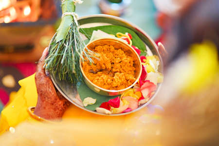 Fresh turmeric paste for Indian wedding haldi ceremonyの写真素材