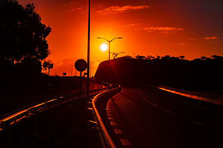 Sunset on highway in the tropical island of Mauritius.