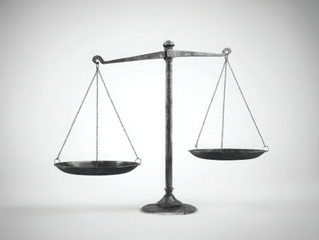 A vintage balance scale with two hanging pans. The scales are made of metal and are set against a plain, clean backdrop. The image evokes concepts of justice, law, and equilibrium.の素材