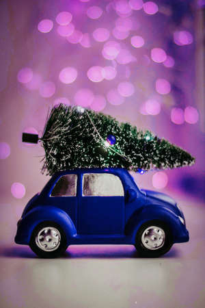 christmas tree on a little toy carの写真素材