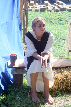Koprivnica's Renaissance Festival 2015., historical mega specacle, Koprivnica's city walls, Croatia.  Girl is resting after crumbling  grapes. 15のeditorial素材
