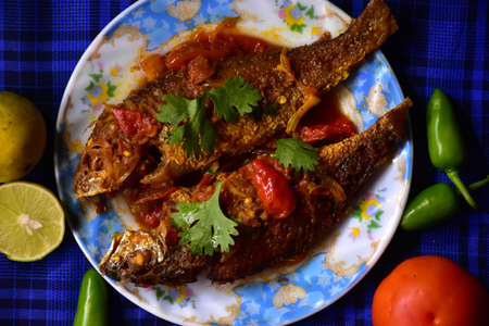 Tomato Bhetki or Barramundiの写真素材