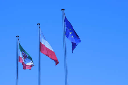 Flags of the city of GorzÃ³w Wielkopolski, Poland and the European Union on the Warta Boulevard in...