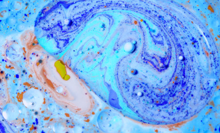 Abstract background with blue and white spots. Liquid paint. Close-up.の写真素材