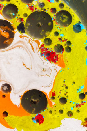 Traditional Ottoman Turkish marbling art patterns as abstract colorful background with golden elementsの写真素材