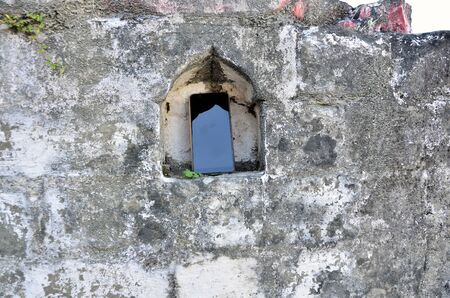 Mobile Set on Wall Besides River Amb India 2の写真素材