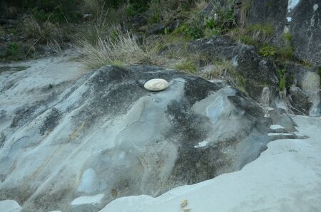 Stone on Rock Beside Shoreline of River Beas Nadaun India 9の写真素材
