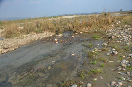 Water Flow in River Beas with Ground Himachal Pradesh Indiaの写真素材