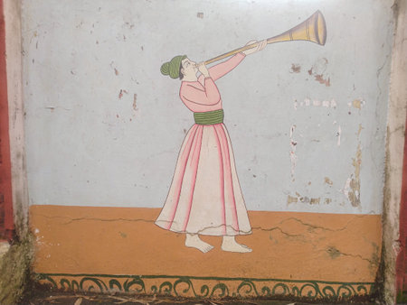 A Person Play Music instruments on Wall Indiaの写真素材