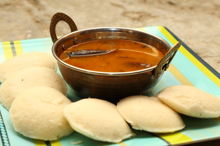 Idly with sambar Iddli is a traditional breakfast of South Indian households,its a very popular savory dish of South Indian cuisine.の写真素材