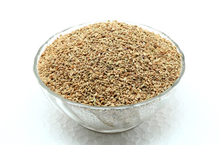 Celery seeds in a glass bowlの写真素材