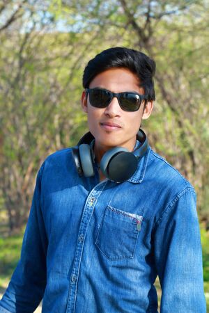 Young male model showing lifestyleの写真素材