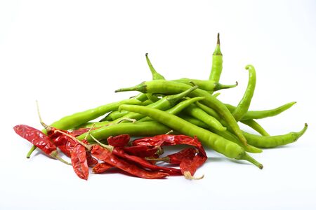 Red and green chilies on white backgroundの写真素材