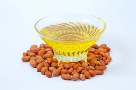 Peanut or groundnut oil in glass bowlの写真素材