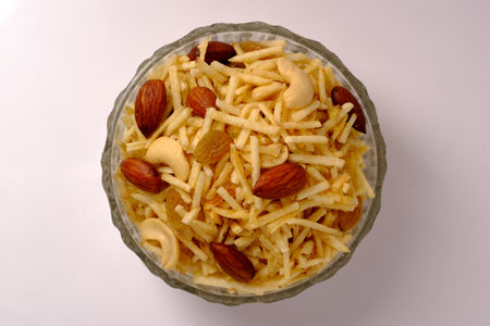 Indian style deep fried snacks falahari chivda- chivda or mixture namkeen with dry fruits.の写真素材