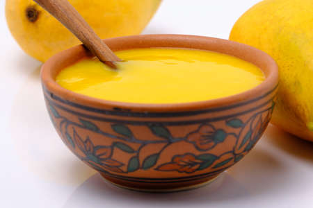 Mango juice or shake in bowlの写真素材