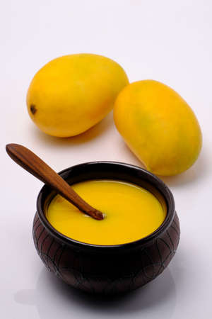 Mango juice or shake in bowlの写真素材