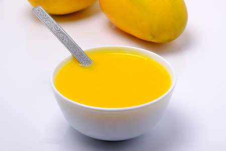 Mango juice or shake in bowlの写真素材