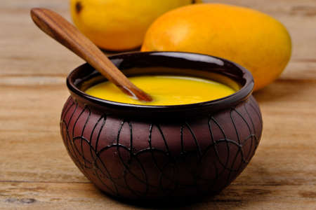 Mango juice or shake in bowlの写真素材