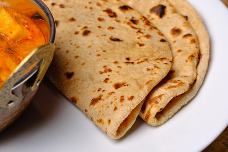 Indian style bread or roti served in a plateの写真素材