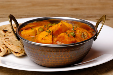 Indian style cottage cheese dish or curry with rotiの写真素材