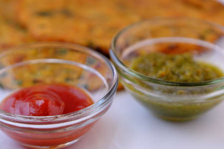 Green Mint Chutney Made with Coriander, pudina And Spices.