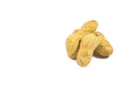 Peanuts close up placed on white backgroundの写真素材