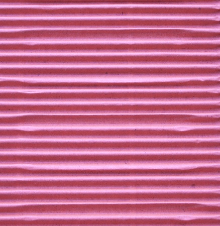 Textured corrugated striped cardboard with natural fiber partsの写真素材