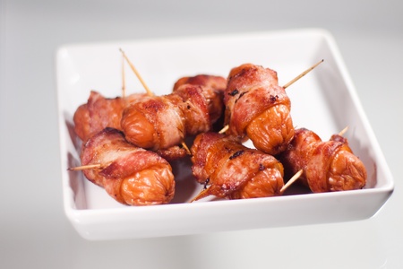 Sausages wrapped in baconの写真素材