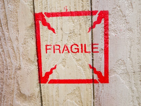 fragile sign on wooden board の写真素材