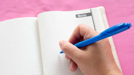 Hand writing on notebook