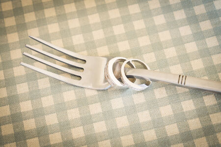 wedding rings and fork