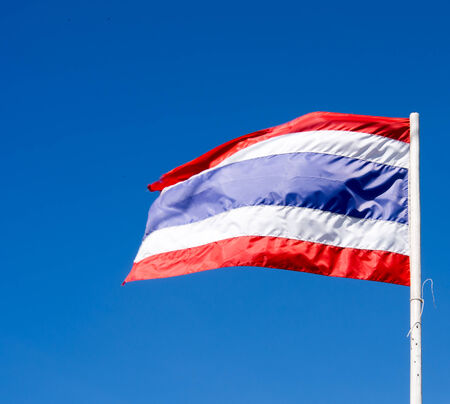 Thai flag with blue skyの写真素材
