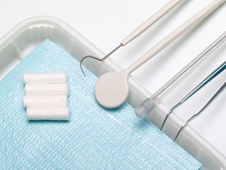 set of dental tools on white