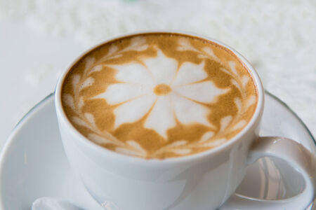 hot milk art coffee , shallow DOFの写真素材