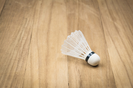 A badminton on wood backgroundの写真素材
