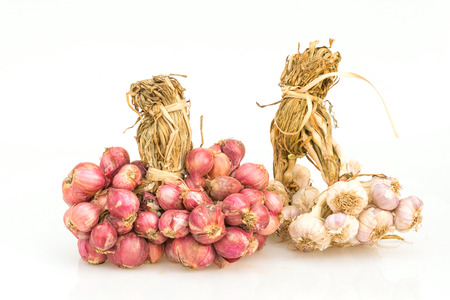 Garlic and onion on white backgroundの写真素材